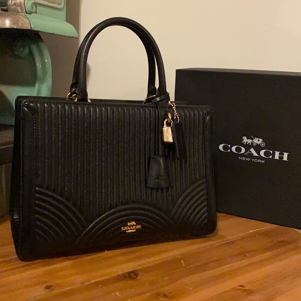 Coach Zoe Carryall bag with Art Deco quilting.